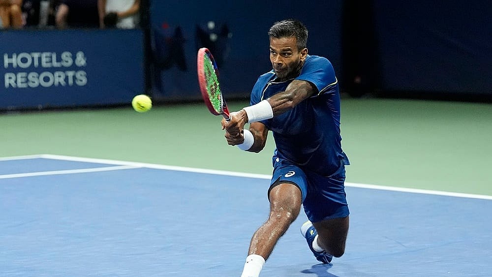 | Photo: AP/Matt Rourke : 2024 US Open: Sumit Nagal returns a shot to Tallon Griekspoor